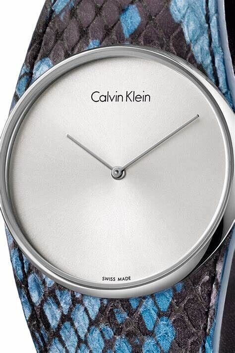 CALVIN KLEIN Spellbound Damenarmbanduhr silbernes Zifferblatt blaues Lederarmband