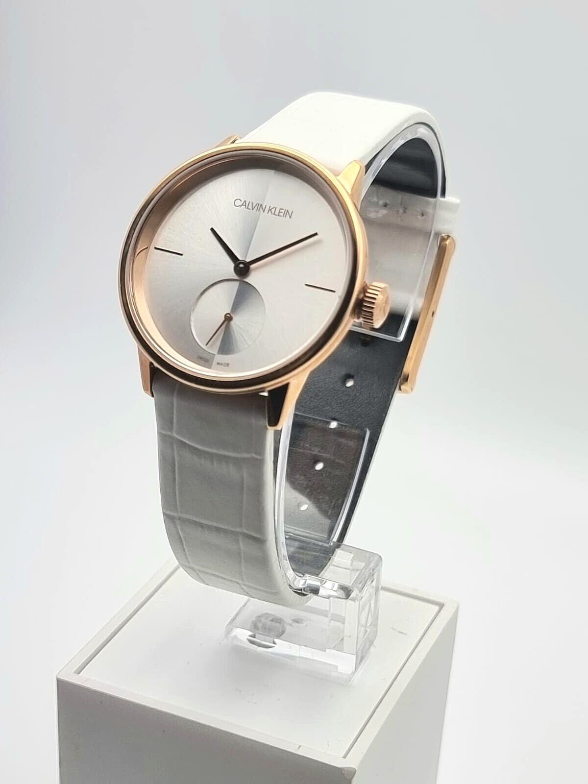 CALVIN KLEIN Damenarmbanduhr mit silbernem Zifferblatt und weißem Leder