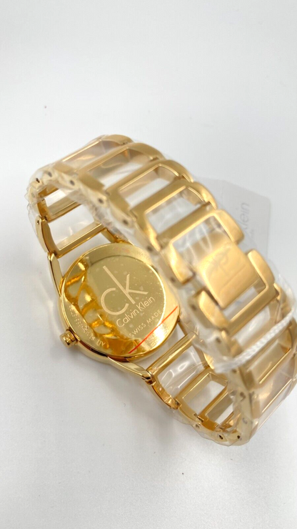 CALVIN KLEIN Quarz Damenarmbanduhr silbernes Zifferblatt gelbgoldene Beschichtung