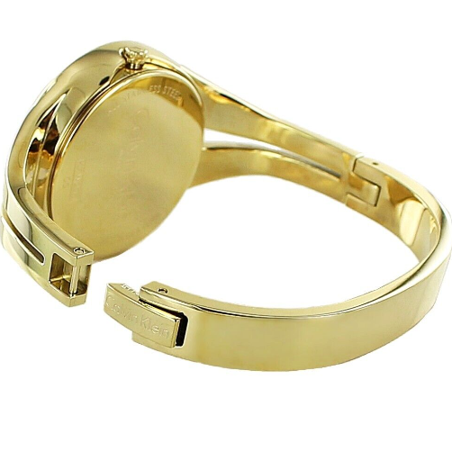 CALVIN KLEIN Addict Damen Uhr mit schwarzem Zifferblatt und goldfarbenem Armreif