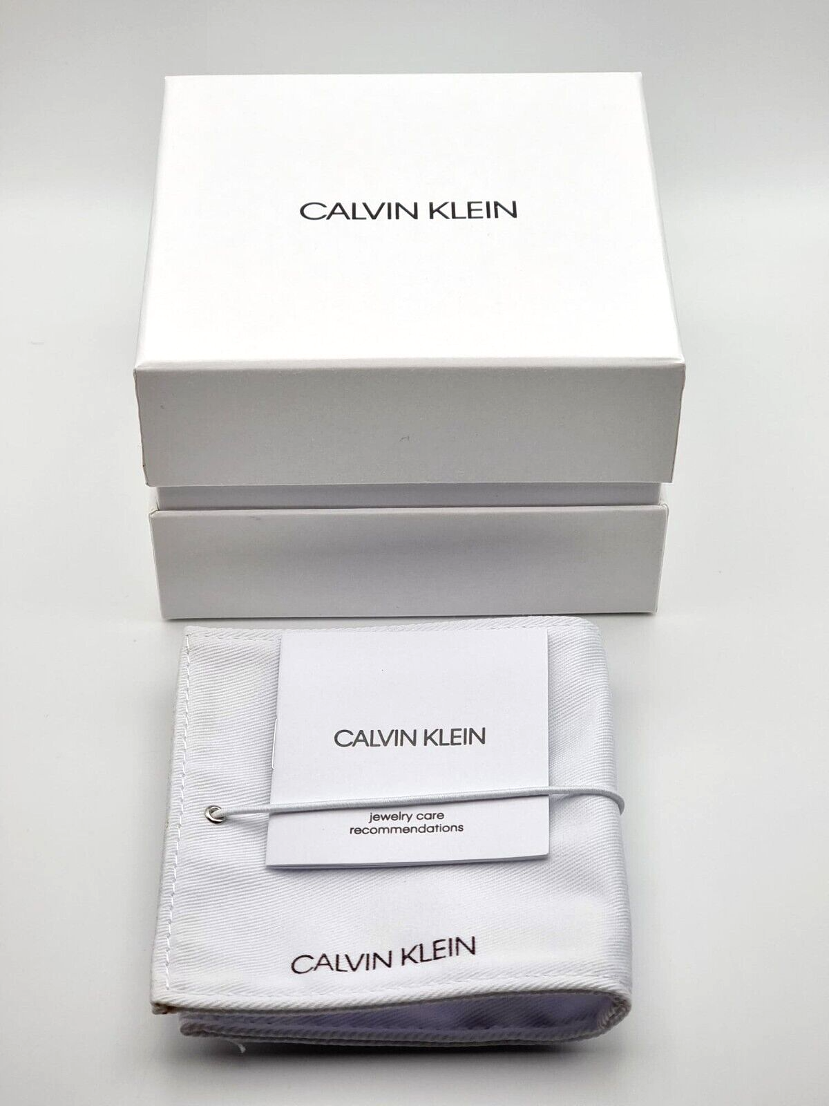 CALVIN KLEIN ROCKING KJ9CAN040100 STAINLESS STEEL NECKLACE - GREY CRYSTALS