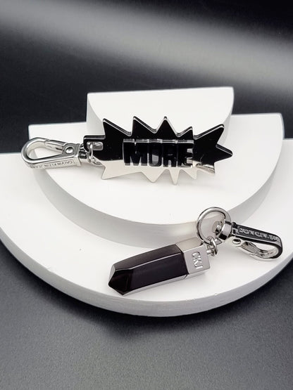 CALVIN KLEIN JEANS DOWNTOWN KJJCBA090100 EDELSTAHL/ SCHWARZE CHARMS