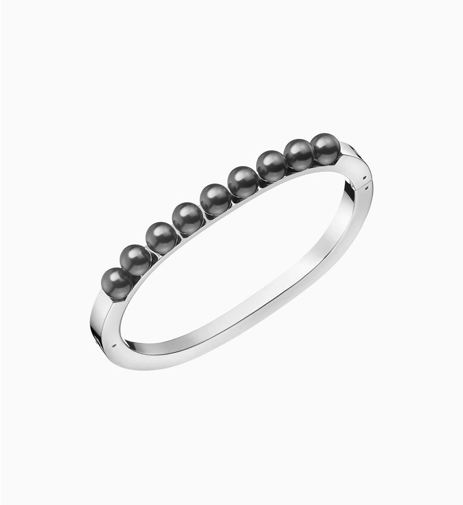 Calvin Klein Damen-Armband aus Edelstahl, silberfarben, mit kreisförmigem Design. Elegantes Schmuckstück für Damen.