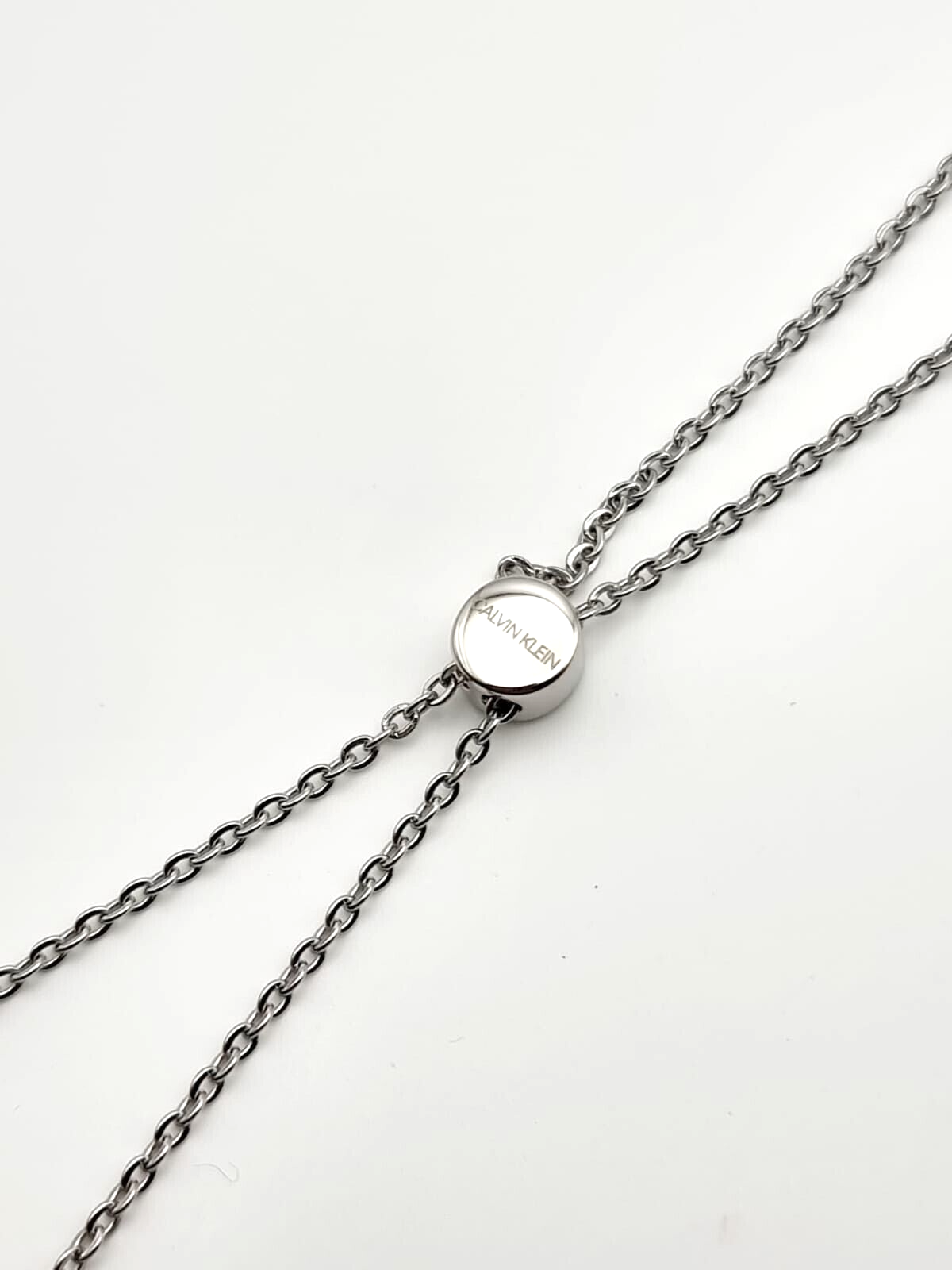 Calvin Klein Brilliant Damen-Halskette aus Edelstahl mit blauen Charms und Anhänger, elegantes Schmuckstück für Damen
