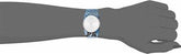 Calvin Klein Spellbound Damenuhr mit 39mm Edelstahlgehäuse, silbernes Zifferblatt und blauem Lederarmband.