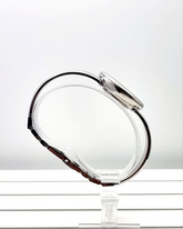 Calvin Klein Seduce Quarzuhr Swiss Made mit Lederarmband und schlichtem Zifferblatt, elegante Damenuhr.