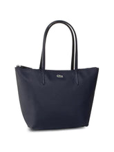 Damentasche von Lacoste, dunkelblaue Shopping Bag, aus robustem Material mit Marken-Logo, leicht und stilvoll für den Alltag.